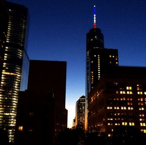 Breathing in a rooftop view in the city at sunset